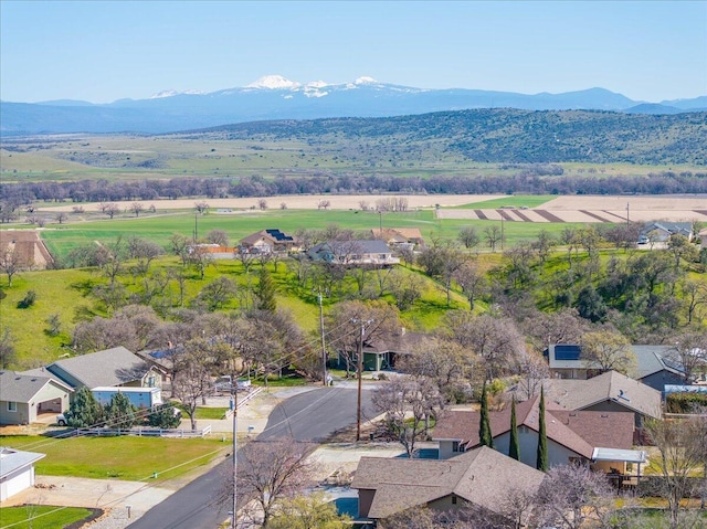 drone / aerial view with a mountain view and a rural view