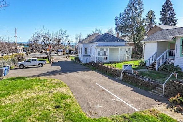 view of front of home with a front yard