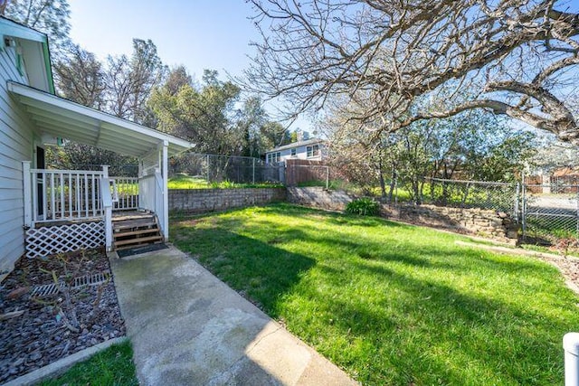view of yard featuring a fenced backyard