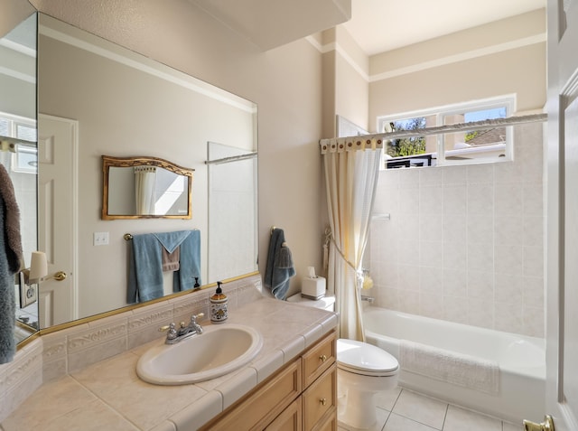 full bathroom with vanity, tile patterned floors, toilet, and washtub / shower combination