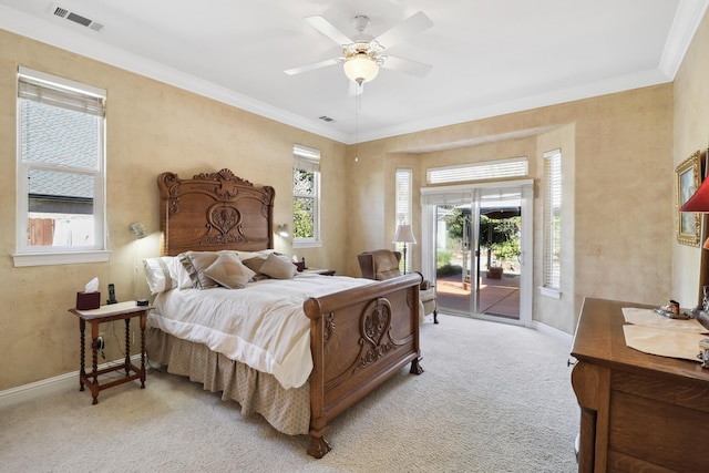 bedroom featuring visible vents, multiple windows, light colored carpet, and access to outside