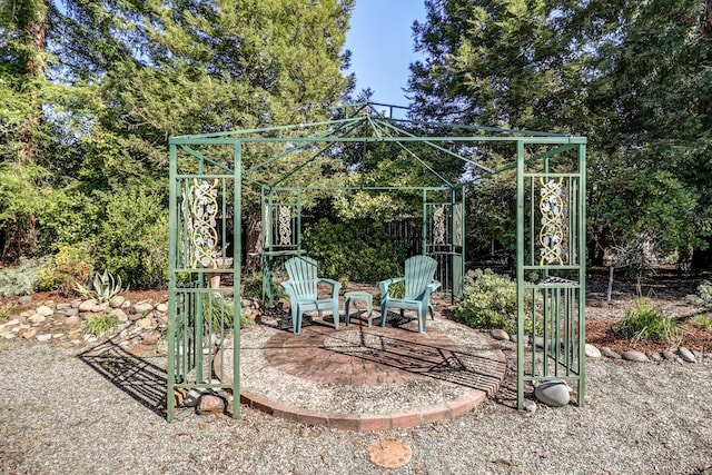 exterior space with a gazebo and a patio area