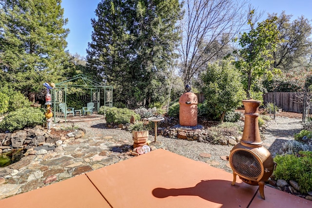 view of patio / terrace with a gazebo and fence