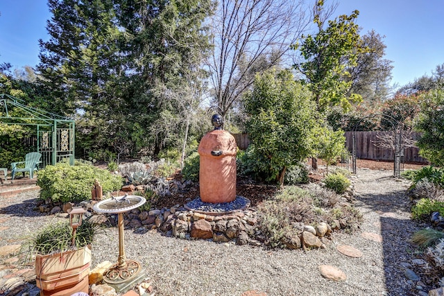 view of yard featuring a gazebo and fence