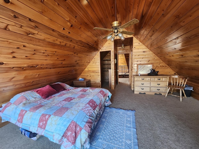 bedroom with carpet floors, wooden walls, wood ceiling, and vaulted ceiling