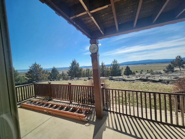 balcony featuring a mountain view