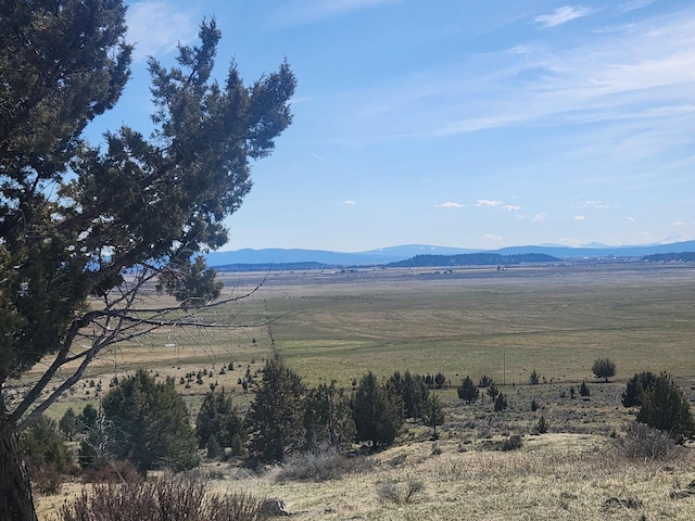 property view of mountains featuring a rural view