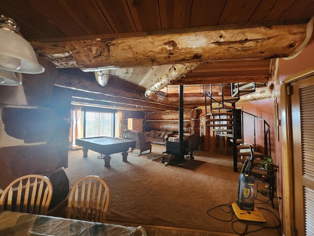 game room featuring carpet, a wood stove, pool table, wood ceiling, and rustic walls