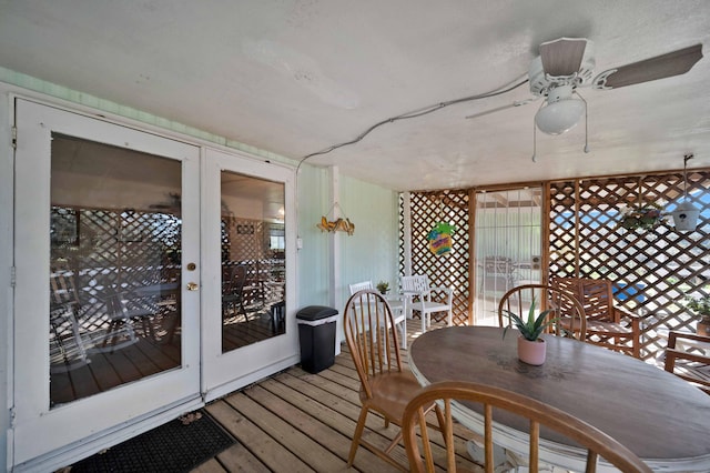 exterior space featuring a ceiling fan and french doors