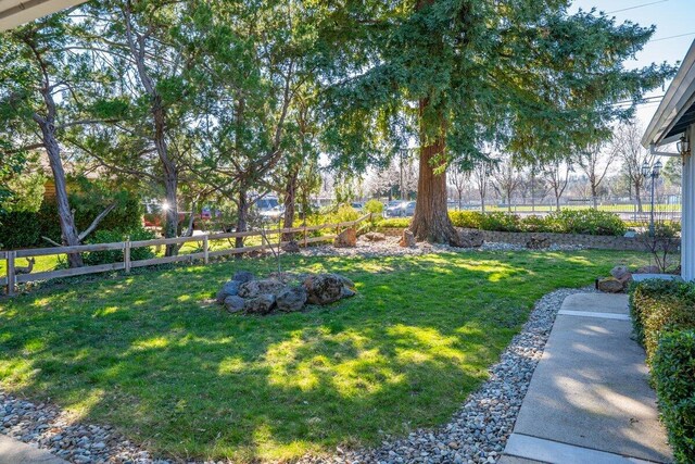 view of yard with fence