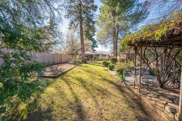 view of yard with fence