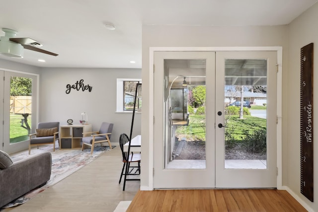 entryway featuring recessed lighting, french doors, a ceiling fan, and wood finished floors