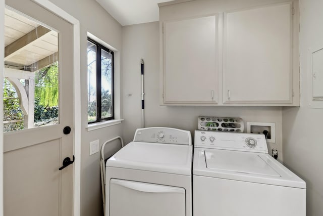 laundry room featuring washer and dryer and cabinet space