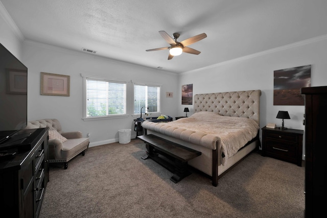 bedroom featuring a ceiling fan, baseboards, visible vents, carpet floors, and crown molding