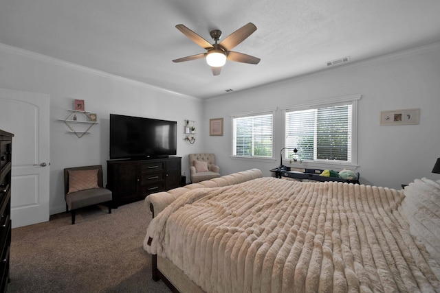 carpeted bedroom featuring visible vents, crown molding, and a ceiling fan