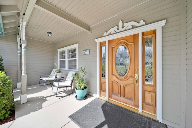 property entrance with a porch