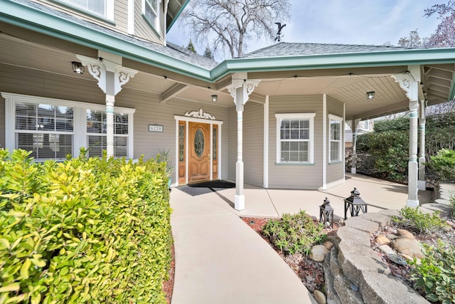 doorway to property with a porch