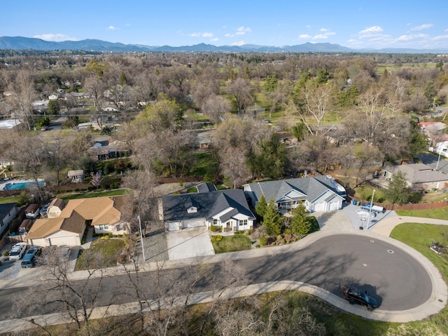 birds eye view of property with a residential view and a mountain view