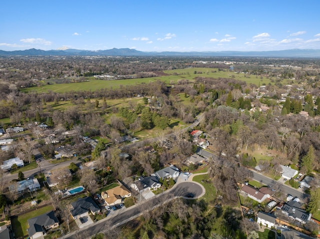 birds eye view of property featuring a mountain view and a residential view