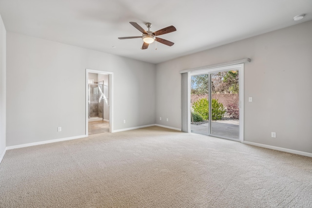 unfurnished room featuring light colored carpet, baseboards, and ceiling fan