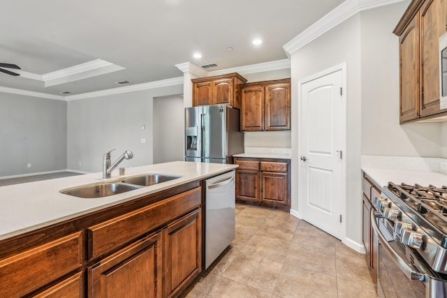 kitchen featuring visible vents, ceiling fan, light countertops, appliances with stainless steel finishes, and a sink