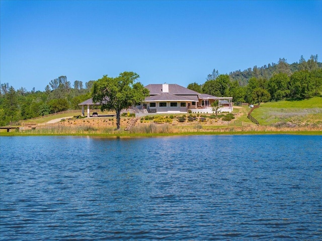 view of water feature with a wooded view
