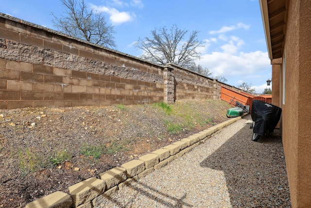 view of yard with a fenced backyard