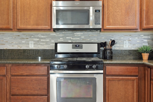 kitchen with decorative backsplash, brown cabinetry, and stainless steel appliances