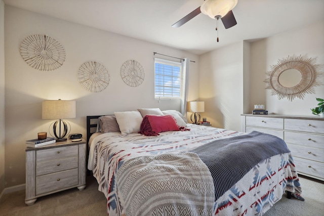 carpeted bedroom with a ceiling fan