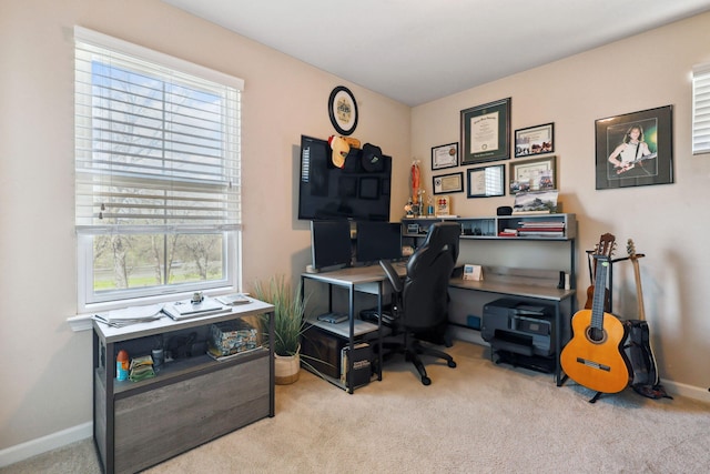 office featuring baseboards and carpet floors