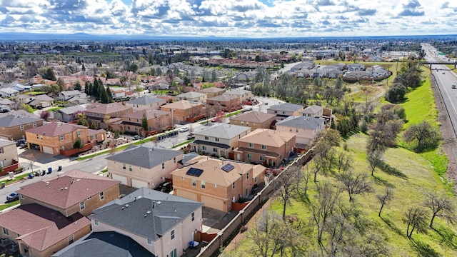 drone / aerial view with a residential view