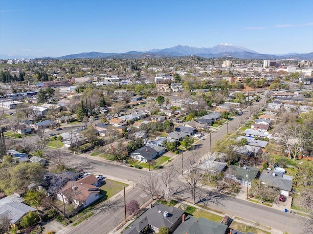 drone / aerial view featuring a mountain view and a residential view