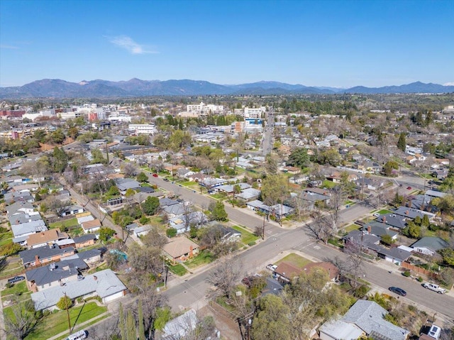 aerial view featuring a mountain view and a residential view