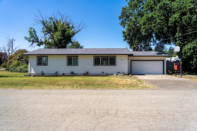 7100 Aldo Way, Anderson, CA 96007 - single story home featuring an attached garage, asphalt driveway, and a front lawn