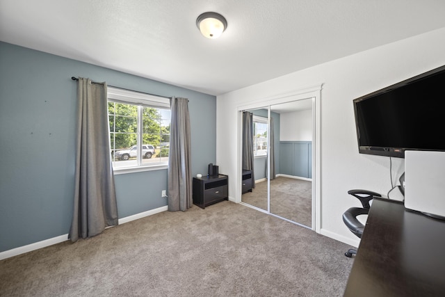 7100 Aldo Way, Anderson, CA 96007 - carpeted bedroom with multiple windows, an office area, and baseboards