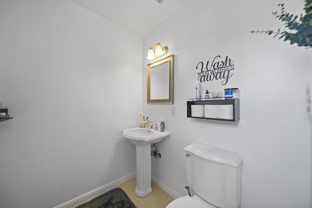 7100 Aldo Way, Anderson, CA 96007 - bathroom with toilet, baseboards, tile patterned floors, and a sink