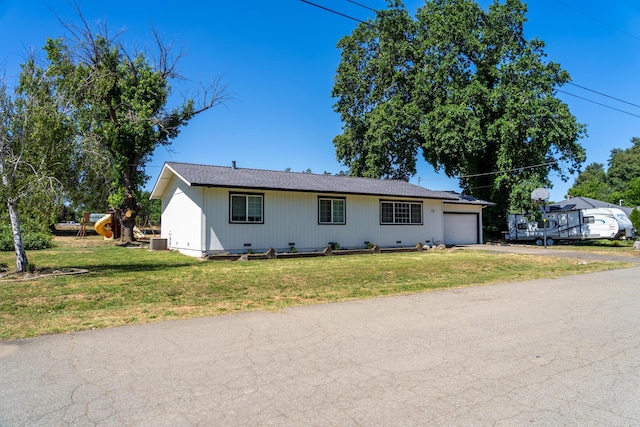 7100 Aldo Way, Anderson, CA 96007 - single story home featuring driveway, a garage, a front yard, central air condition unit, and crawl space