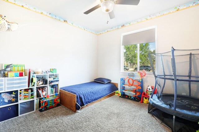 bedroom with carpet flooring and a ceiling fan