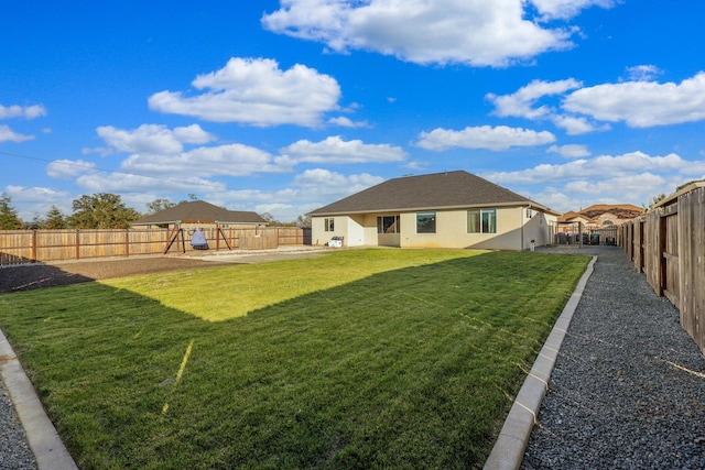 view of yard featuring a fenced backyard