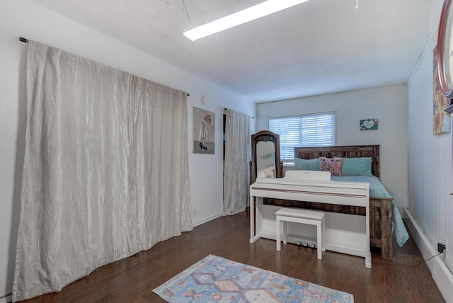 bedroom with wood finished floors