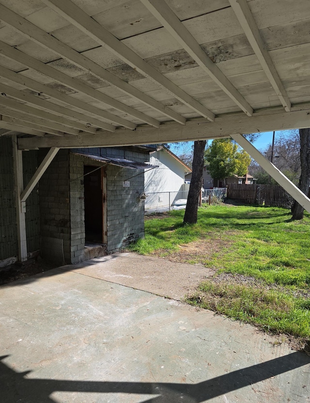 view of patio / terrace featuring fence