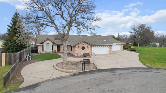 single story home featuring fence, roof with shingles, a front yard, a garage, and driveway