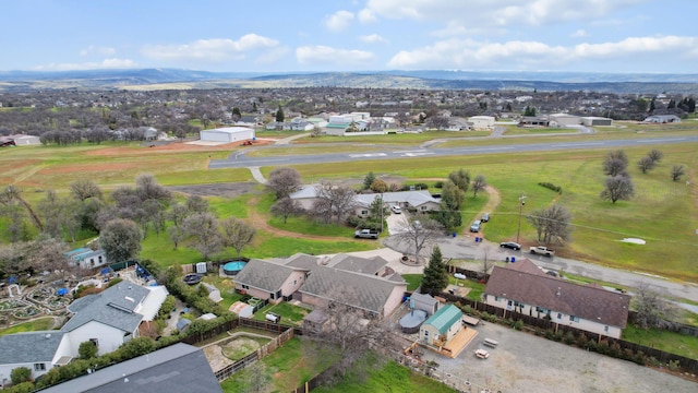 drone / aerial view with a mountain view and a residential view