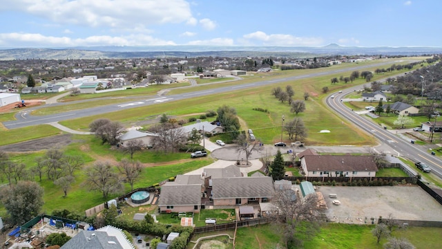 aerial view with a mountain view and a residential view