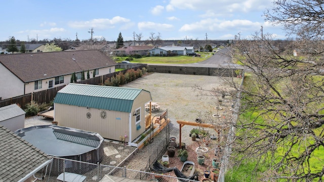 birds eye view of property with a residential view