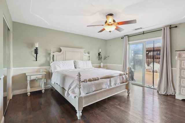 bedroom with visible vents, access to exterior, dark wood finished floors, baseboards, and ceiling fan