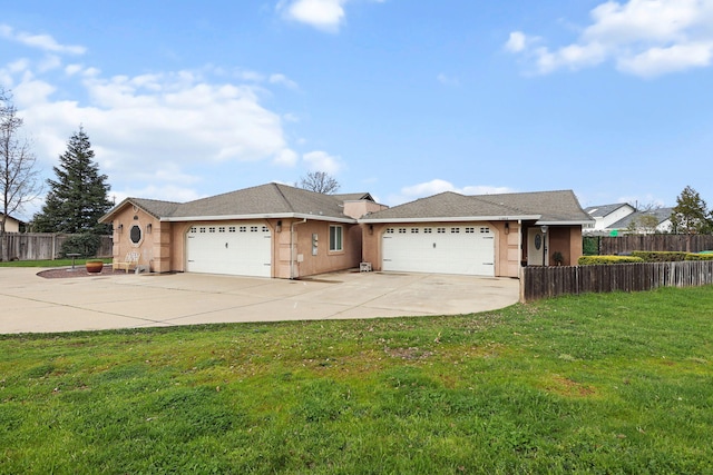 ranch-style house featuring fence, concrete driveway, a front yard, stucco siding, and an attached garage