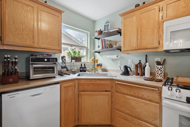 kitchen featuring white appliances, open shelves, a toaster, a sink, and light countertops