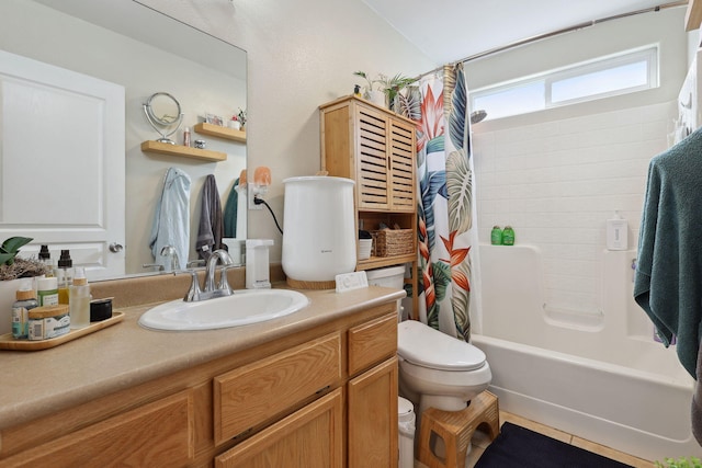 full bathroom featuring vanity, toilet, and shower / bath combo with shower curtain