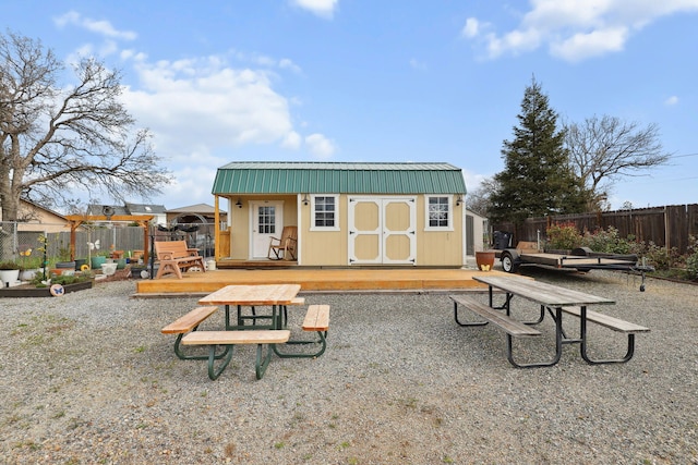 view of shed featuring a fenced backyard